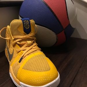 Kyrie Irving 3 boys basketball sneakers.
